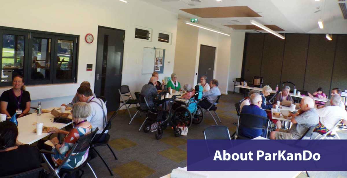 parkando trivia event in progress with participants sitting at tables in the community room at newport community hub